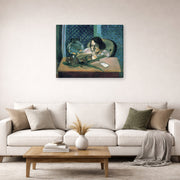 Gallery-wrapped canvas print of Henri Matisse's Woman Before a Fish Bow hanging in a living room, view 2