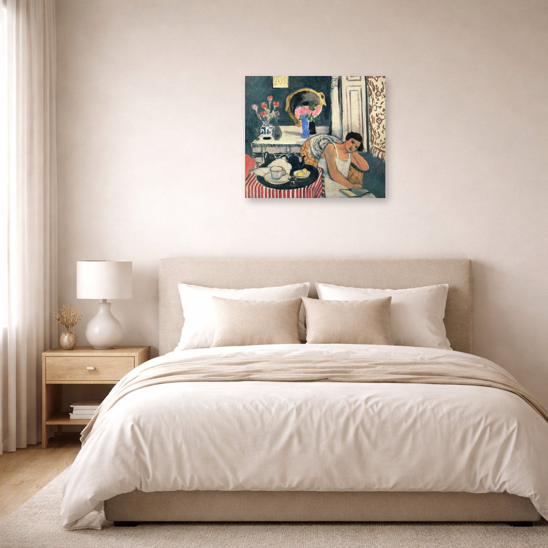 Unframed poster print of Henri Matisse's Woman Reading displayed above a bed in a bedroom
