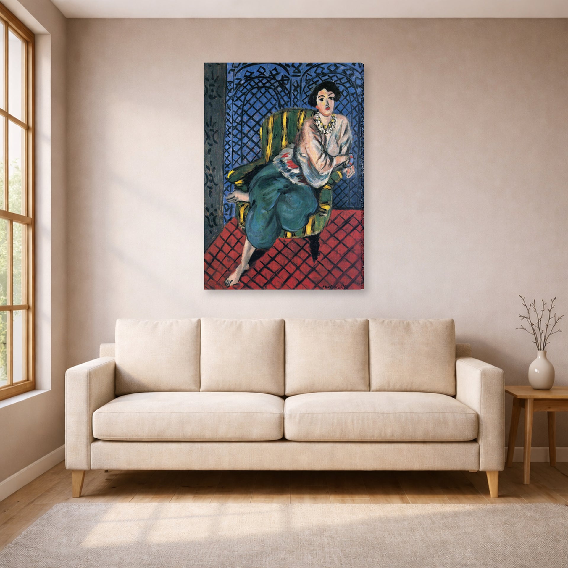 Gallery-wrapped canvas print of Henri Matisse's Woman Sitting in a Chair hanging in a living room, view 1