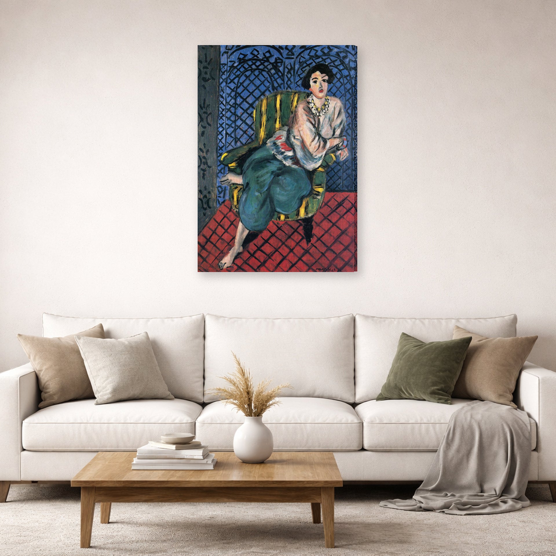 Gallery-wrapped canvas print of Henri Matisse's Woman Sitting in a Chair hanging in a living room, view 2