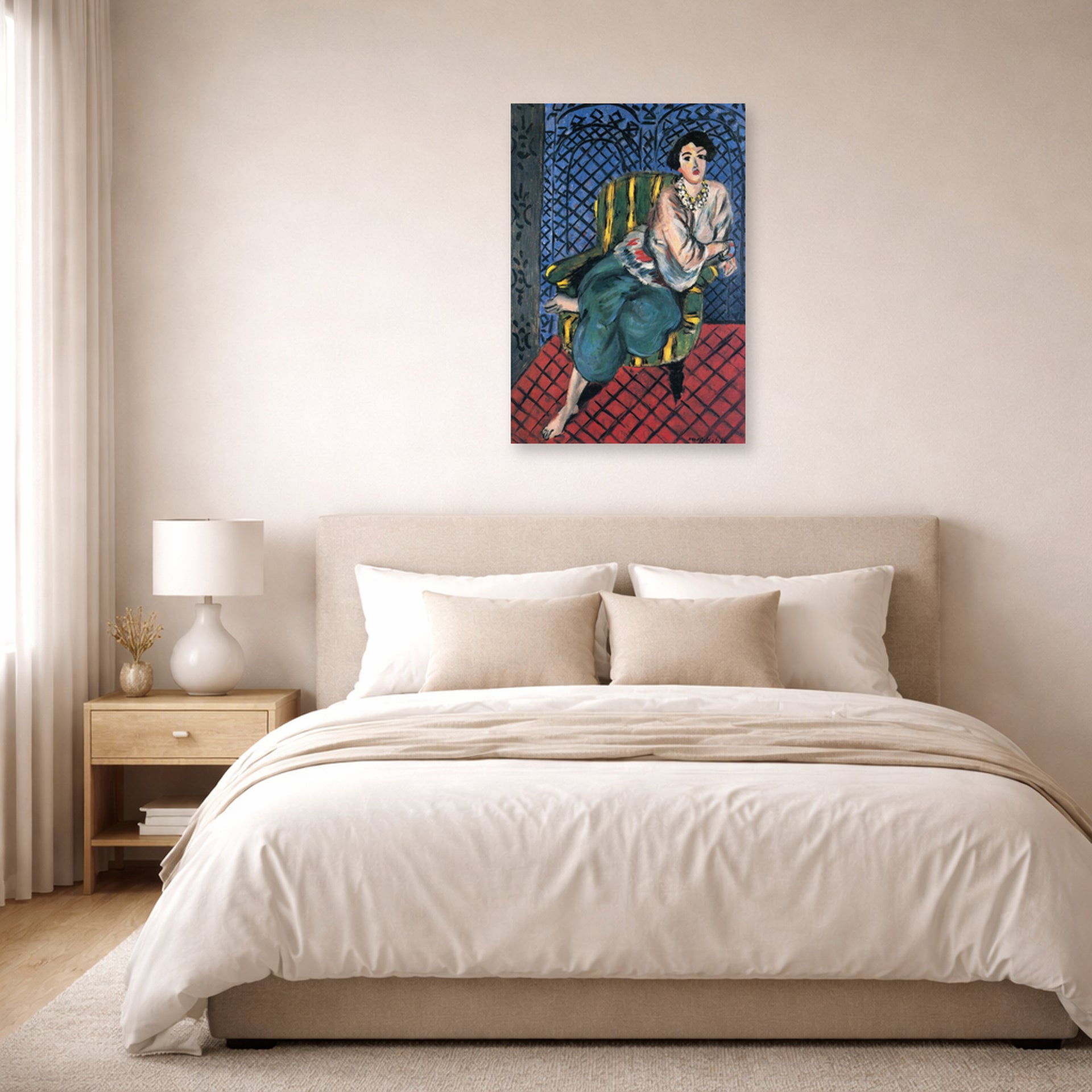 Unframed poster print of Henri Matisse's Woman Sitting in a Chair displayed above a bed in a bedroom