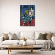 Unframed poster print of Henri Matisse's Woman Sitting in a Chair displayed in a living room, view 2