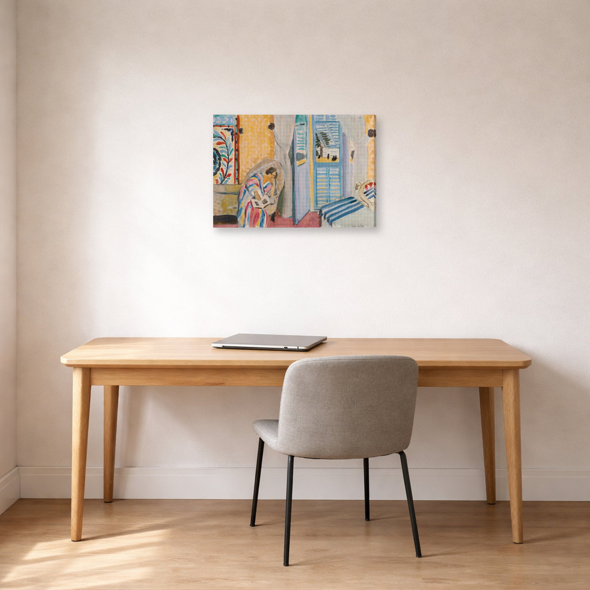 Gallery-wrapped canvas print of Henri Matisse's Woman with a Book hanging in a home office