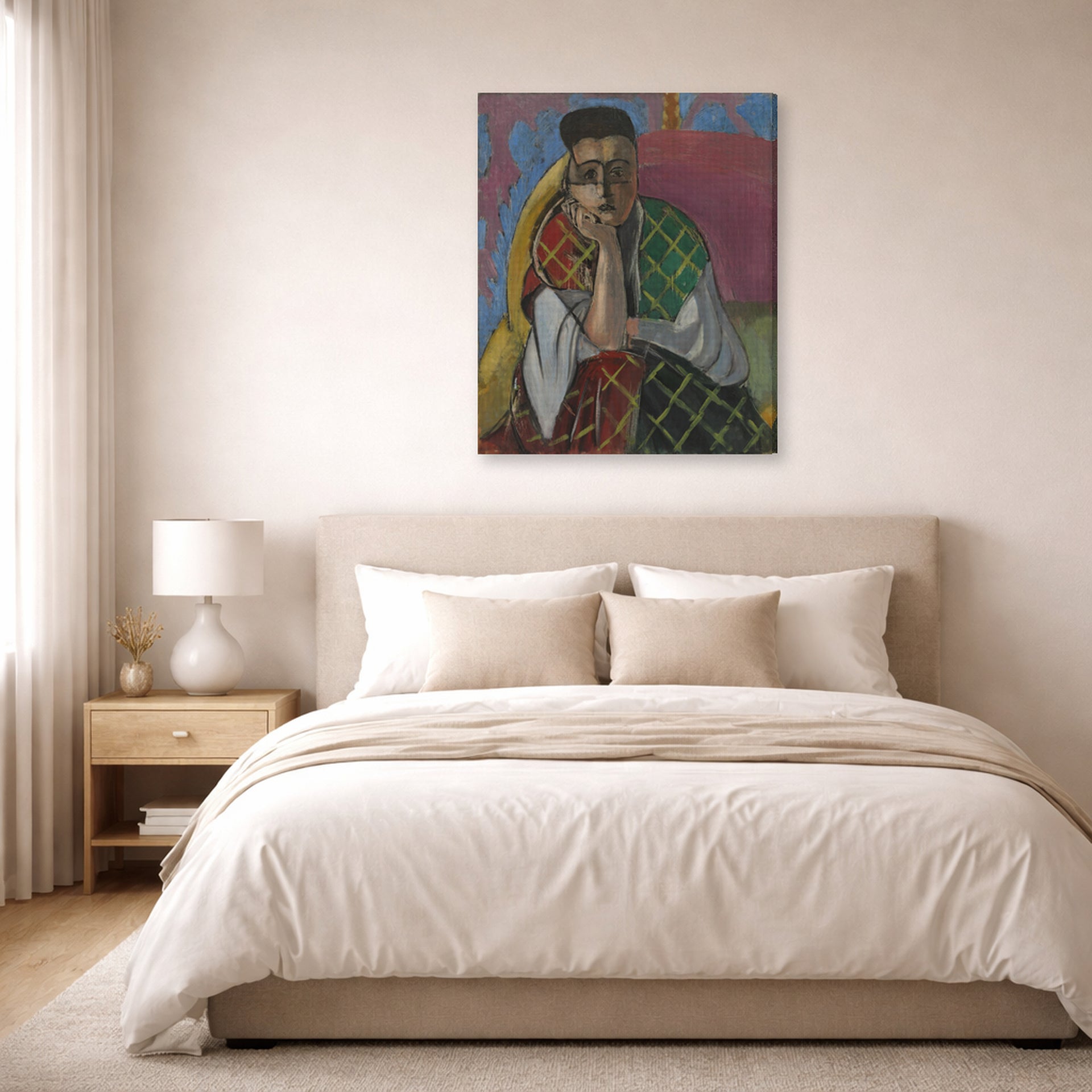 Gallery-wrapped canvas print of Henri Matisse's Woman with a Veil hanging above a bed in a bedroom