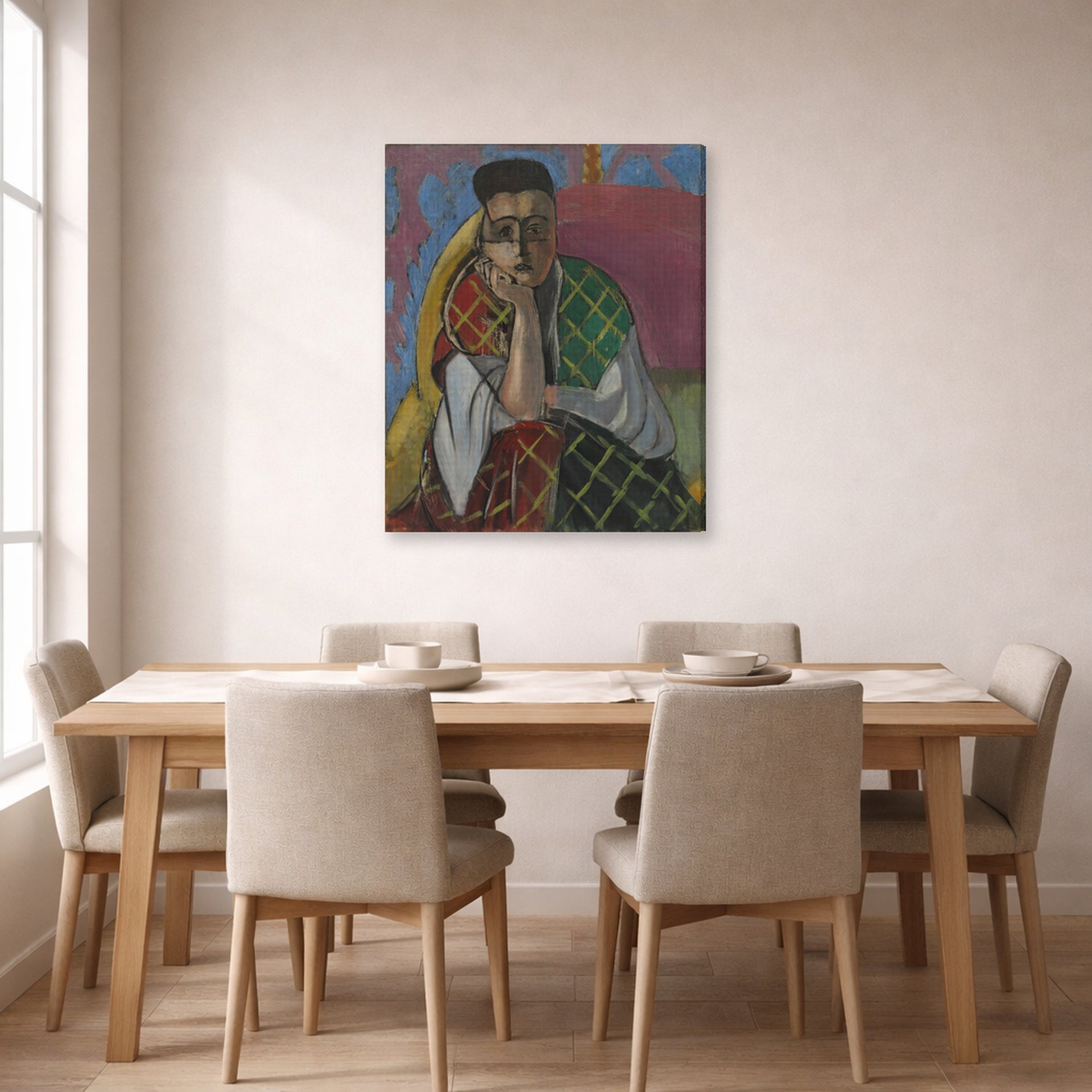 Gallery-wrapped canvas print of Henri Matisse's Woman with a Veil hanging on a dining room wall