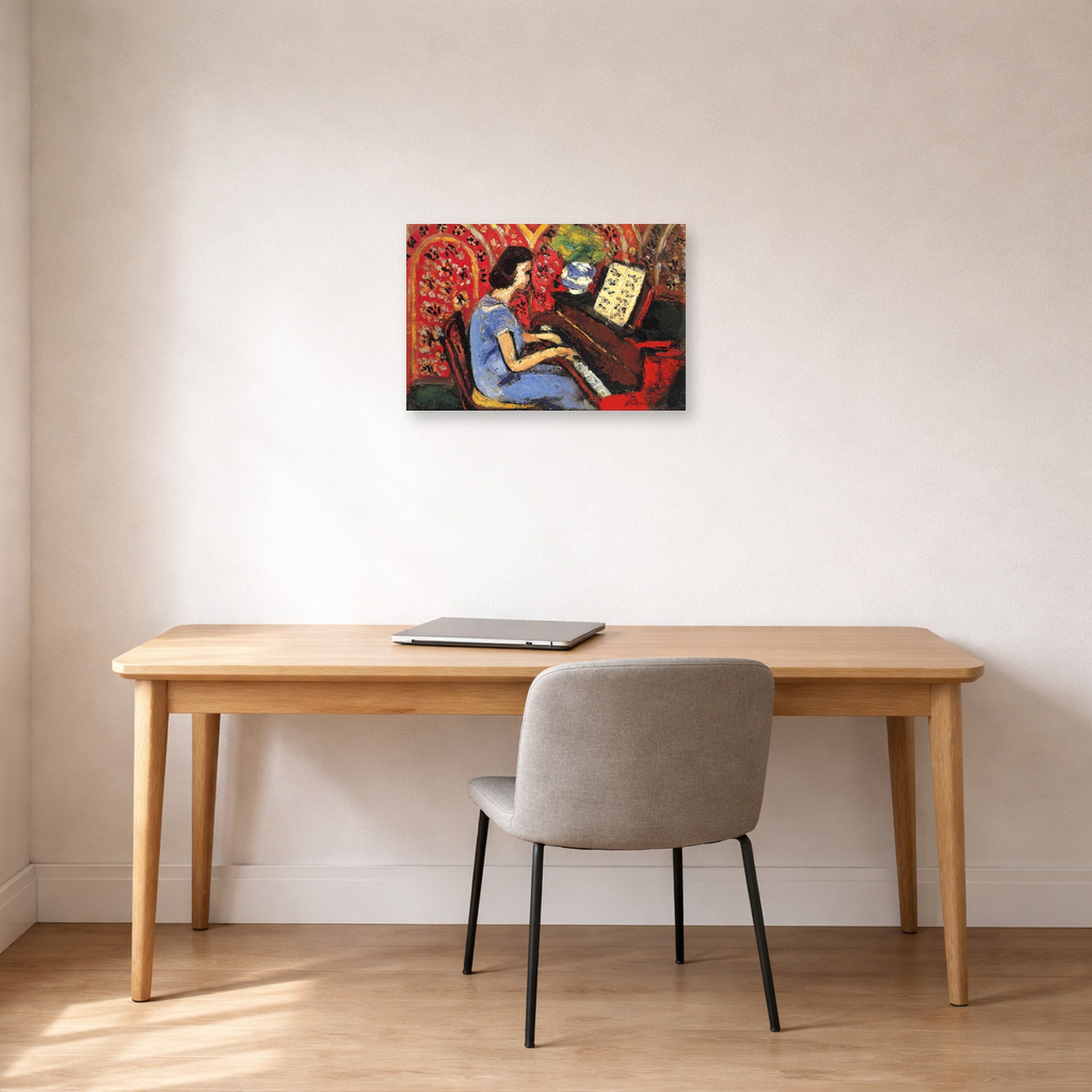 Unframed poster print of Henri Matisse's Woman at Tbe Piano displayed in a home office