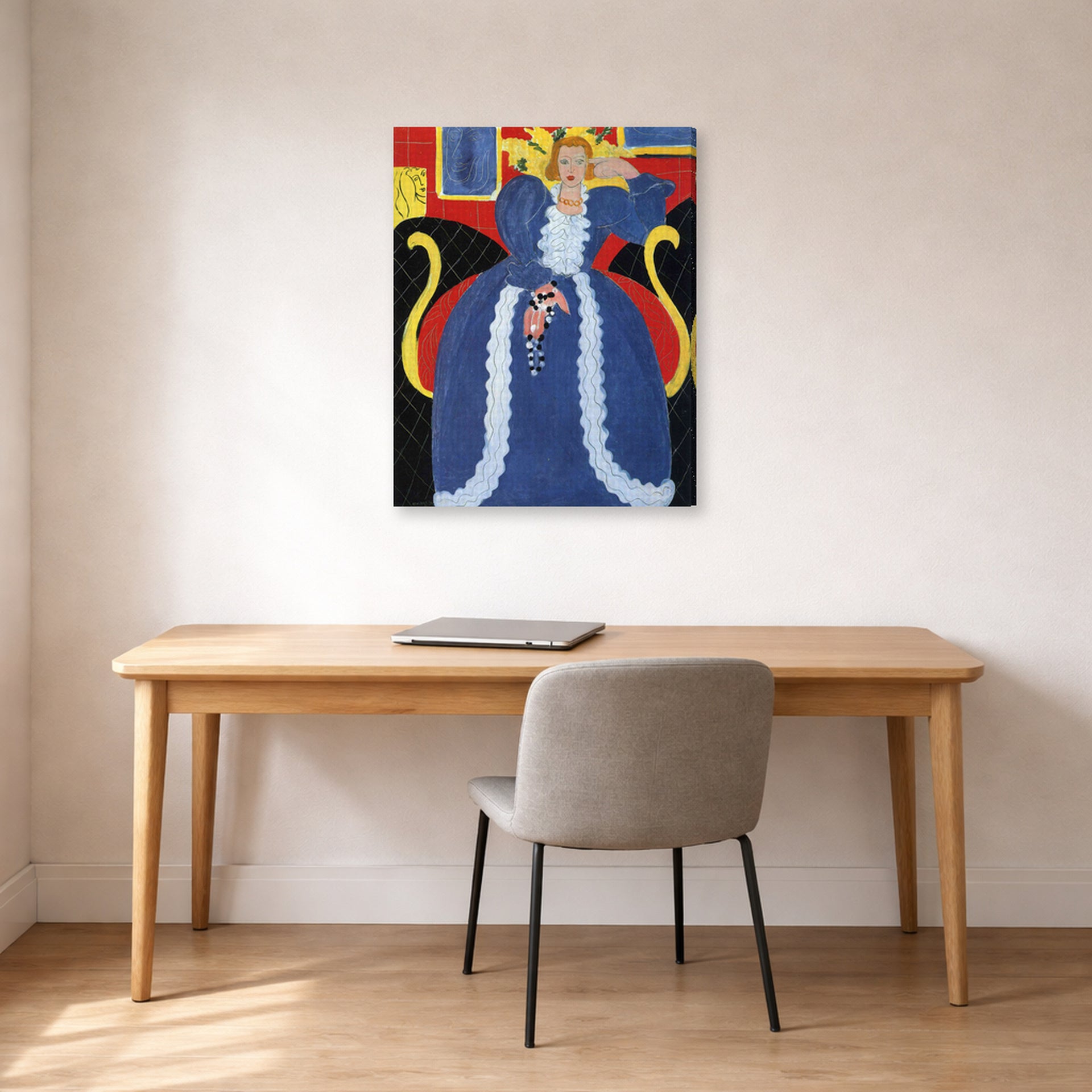 Gallery-wrapped canvas print of Henri Matisse's Woman in Blue, or the Large Blue Robe and Mimosas hanging in a home office