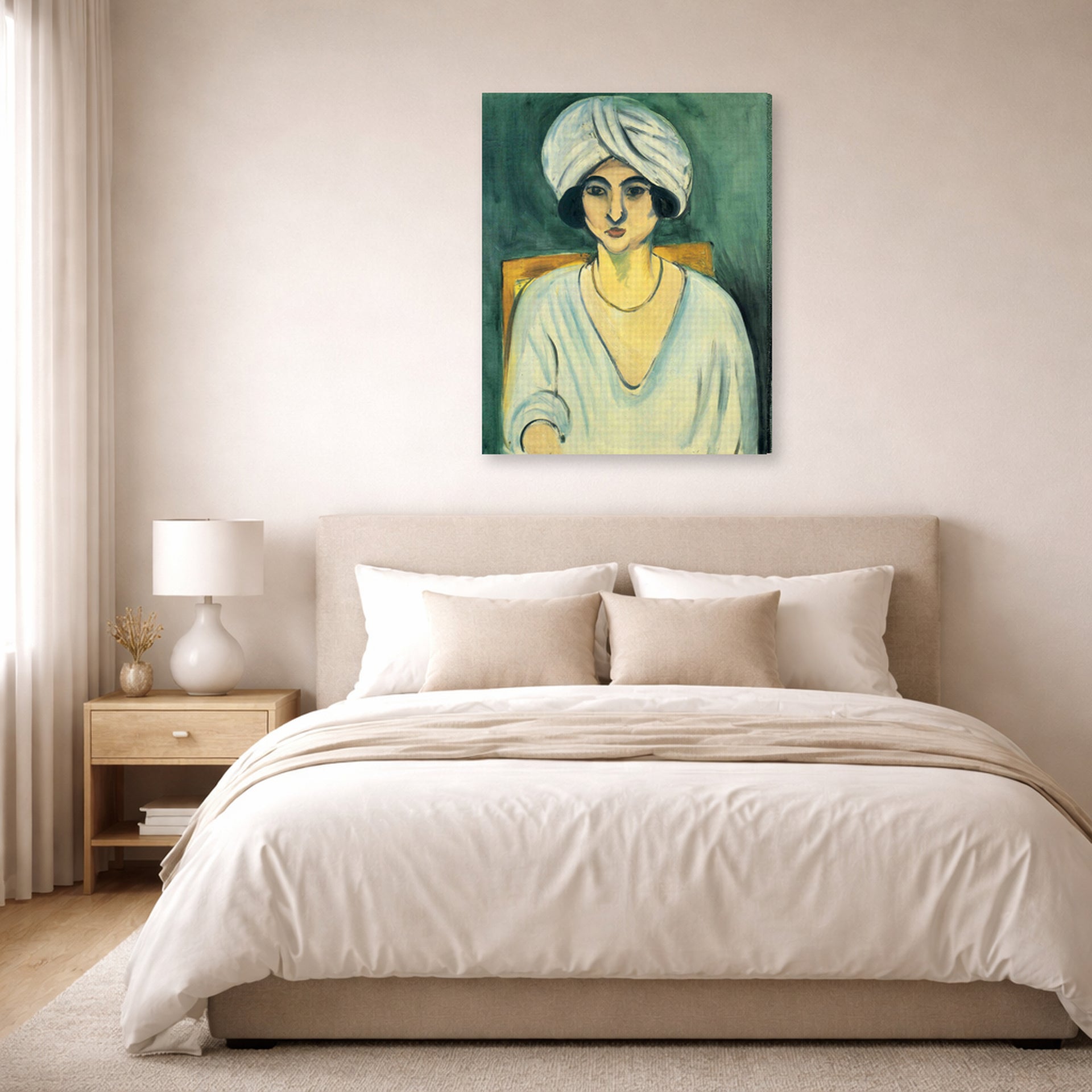 Gallery-wrapped canvas print of Henri Matisse's Woman in Turban hanging above a bed in a bedroom
