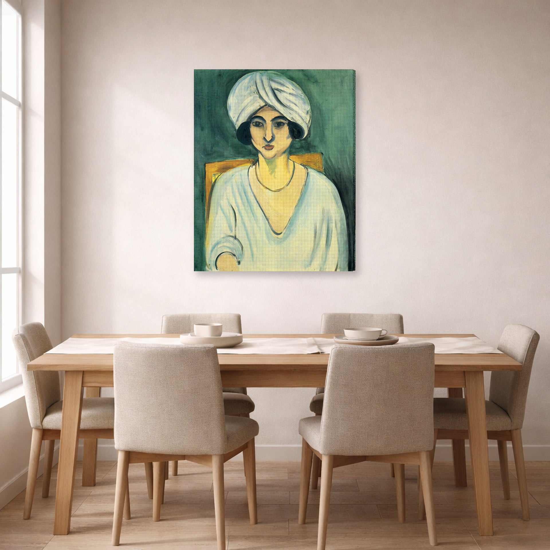 Gallery-wrapped canvas print of Henri Matisse's Woman in Turban hanging on a dining room wall
