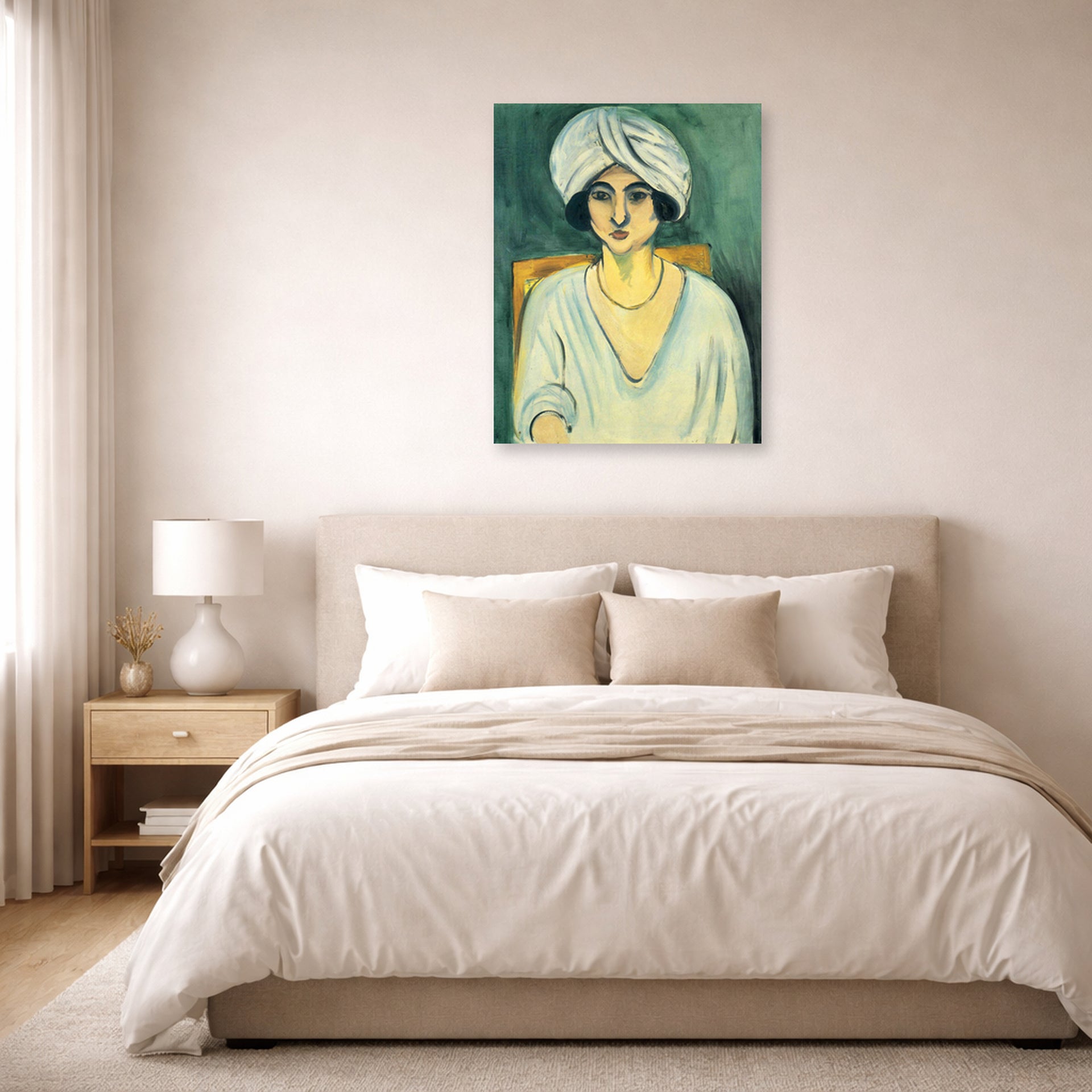 Unframed poster print of Henri Matisse's Woman in Turban displayed above a bed in a bedroom