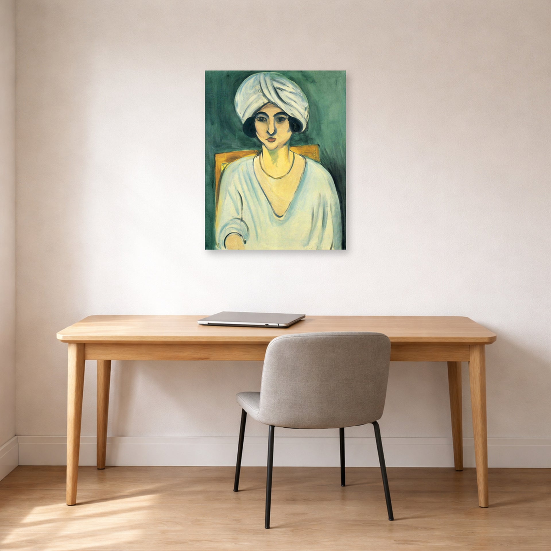 Unframed poster print of Henri Matisse's Woman in Turban displayed in a home office