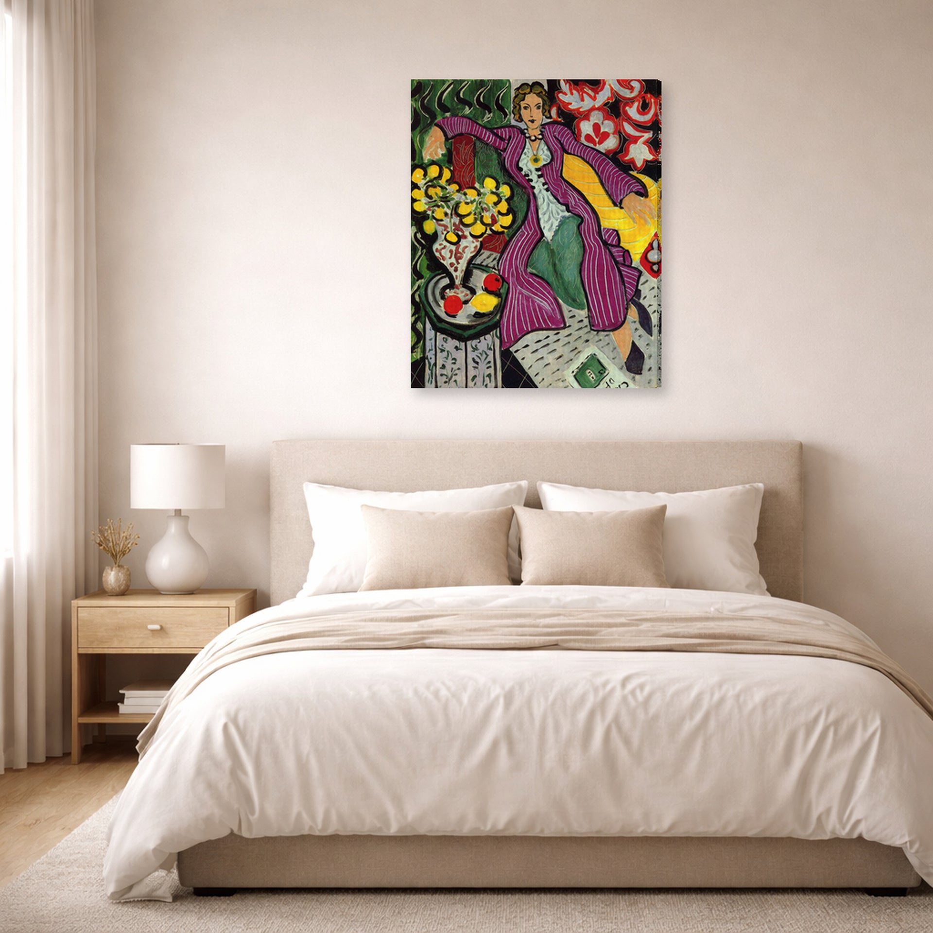 Gallery-wrapped canvas print of Henri Matisse's Woman in a Purple Coa hanging above a bed in a bedroom