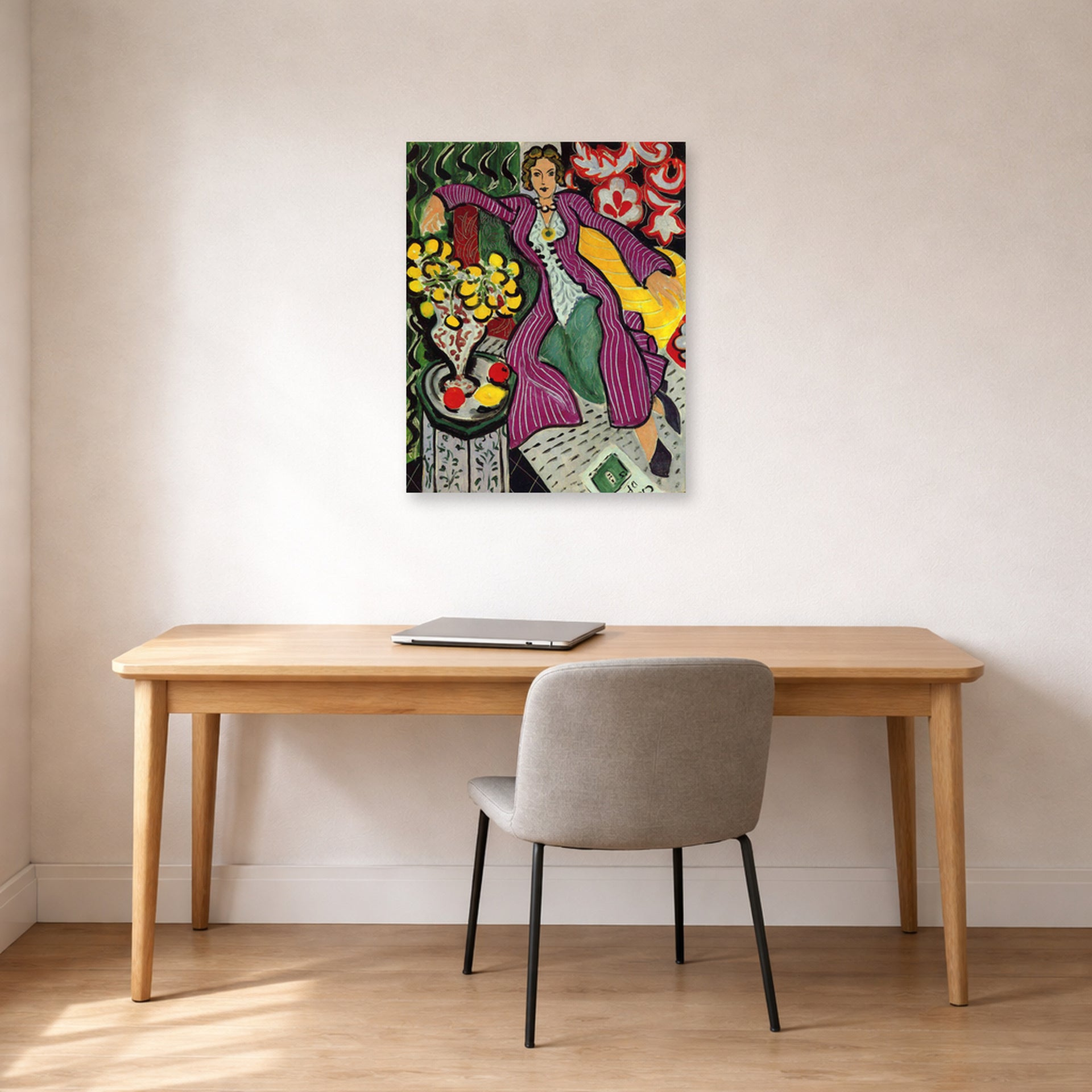 Unframed poster print of Henri Matisse's Woman in a Purple Coa displayed in a home office