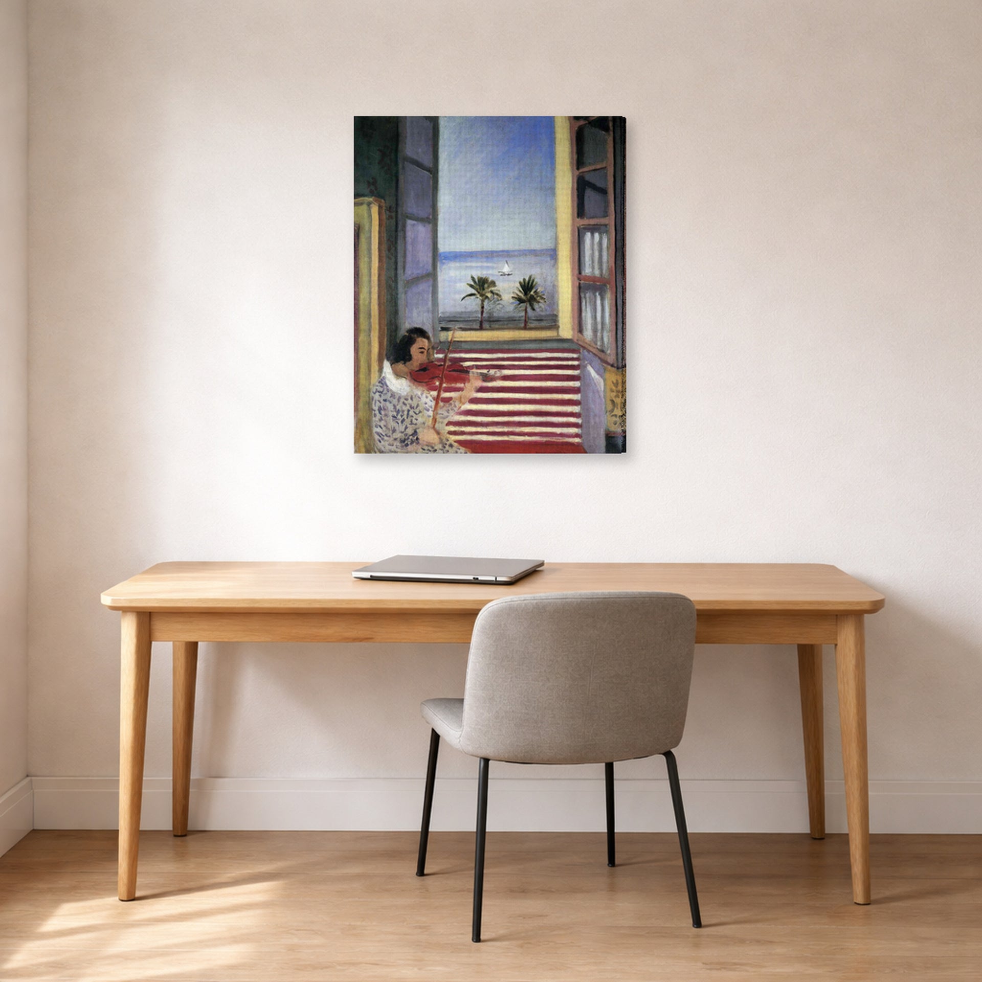 Gallery-wrapped canvas print of Henri Matisse's Young Woman Playing Violin hanging in a home office