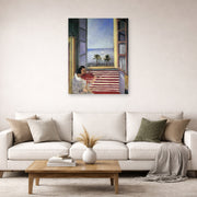 Unframed poster print of Henri Matisse's Young Woman Playing Violin displayed in a living room, view 2