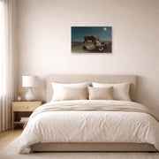 Unframed poster print of Henri Rousseau's La Bohémienne endormie, The Sleeping Gypsy displayed on a wall in a bedroom