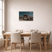 Unframed poster print of Henri Rousseau's La Bohémienne endormie, The Sleeping Gypsy displayed on a wall in a dining room
