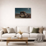 Unframed poster print of Henri Rousseau's La Bohémienne endormie, The Sleeping Gypsy displayed on a wall in a living room