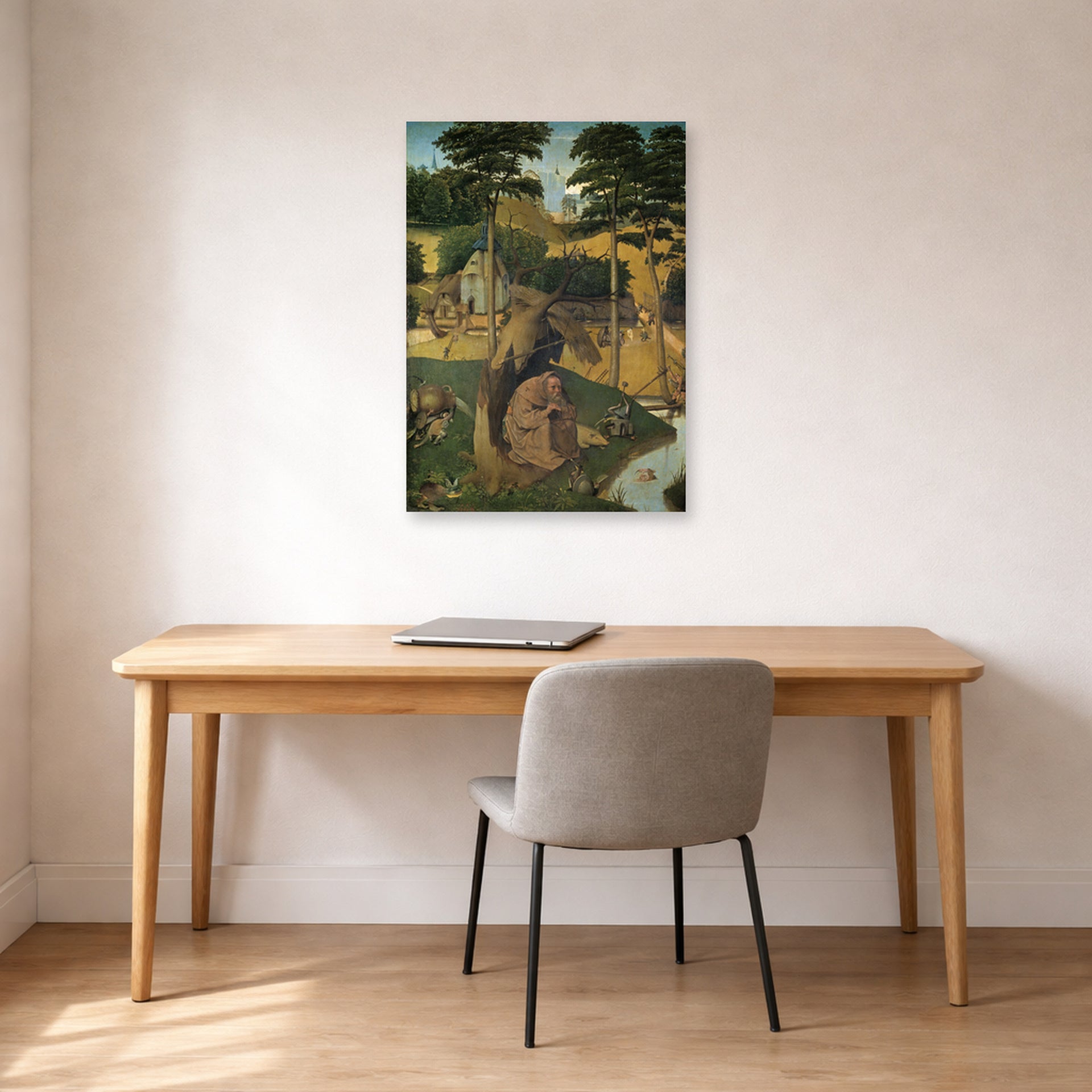 Unframed poster print of Hieronymus Bosch's The Temptation of Saint Anthony displayed on a wall in a office