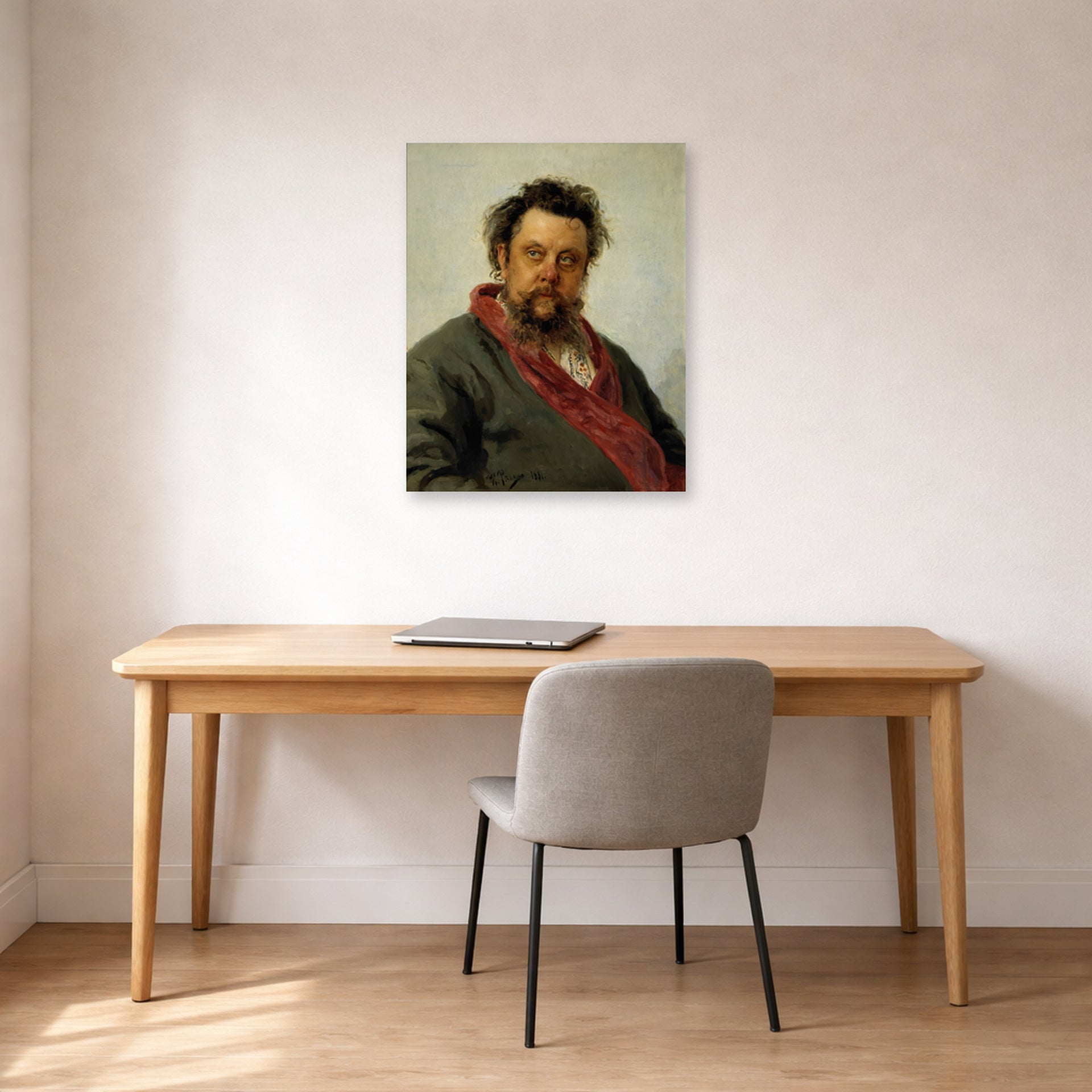 Unframed poster print of Ilya Repin's Portrait of the Composer Modest Mussorgsky displayed on a wall in a office