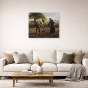 Unframed poster print of Jean-Francois Millet's Potato Planters displayed on a wall in a living room