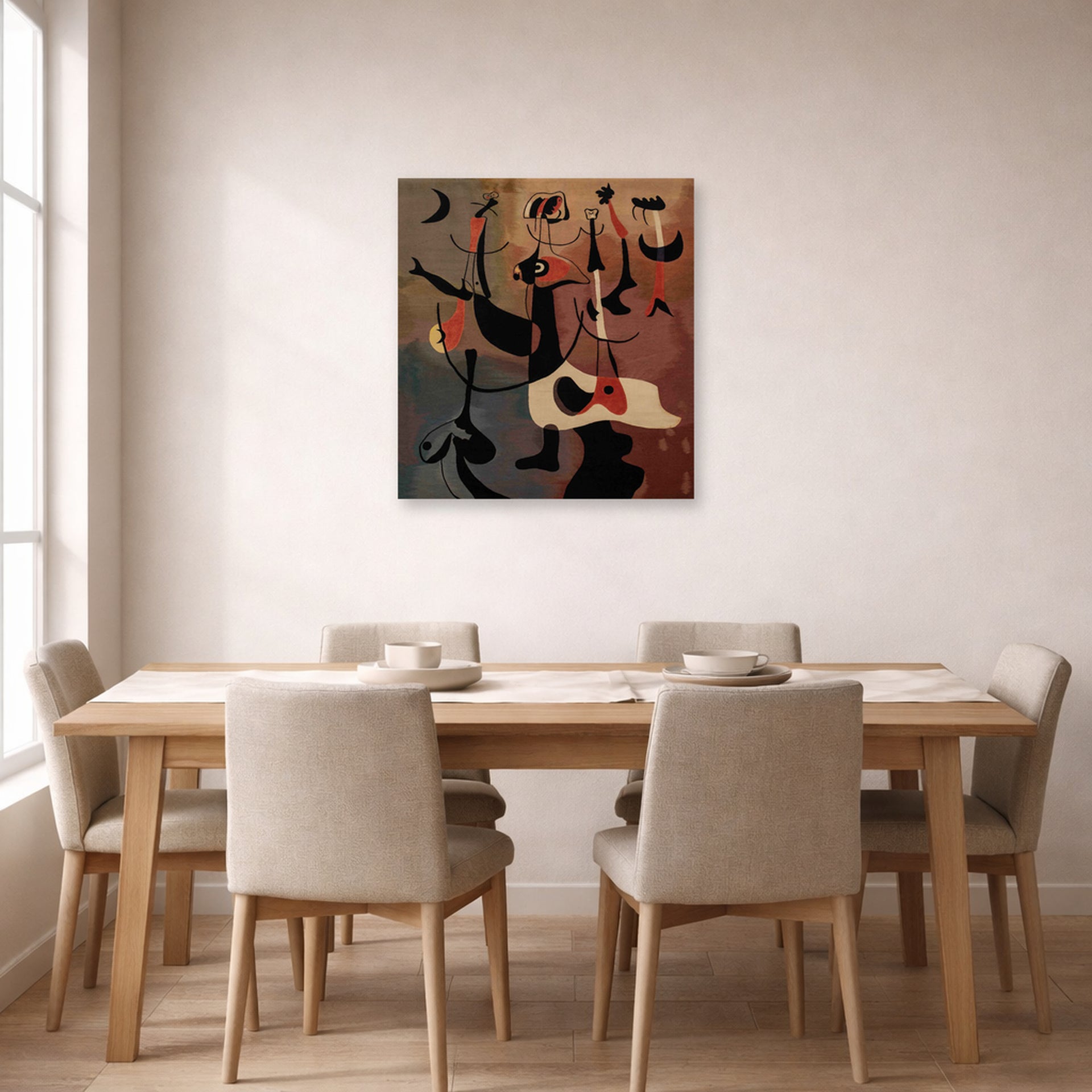 Unframed poster print of Joan Miró's 'An Aubusson Tapestry, Personnages Rythmiques' displayed on a wall in a dining room