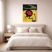Gallery-wrapped canvas print of Joan Miró's 'Bird Flight' displayed on a wall in a bedroom