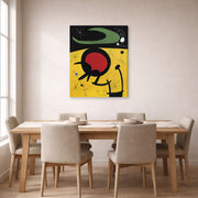 Gallery-wrapped canvas print of Joan Miró's 'Bird Flight' displayed on a wall in a dining room