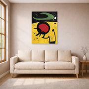 Unframed poster print of Joan Miró's 'Bird Flight' displayed on a wall in a living room