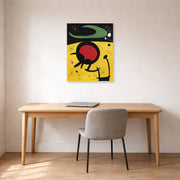 Unframed poster print of Joan Miró's 'Bird Flight' displayed on a wall in a office