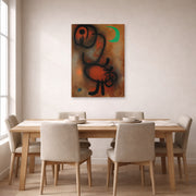 Unframed poster print of Joan Miró's 'Bird' displayed on a wall in a dining room