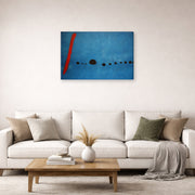 Gallery-wrapped canvas print of Joan Miró's 'Blue' displayed on a wall in a living room