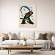 Gallery-wrapped canvas print of Joan Miró's 'Bon Cop De Lluna' displayed on a wall in a living room