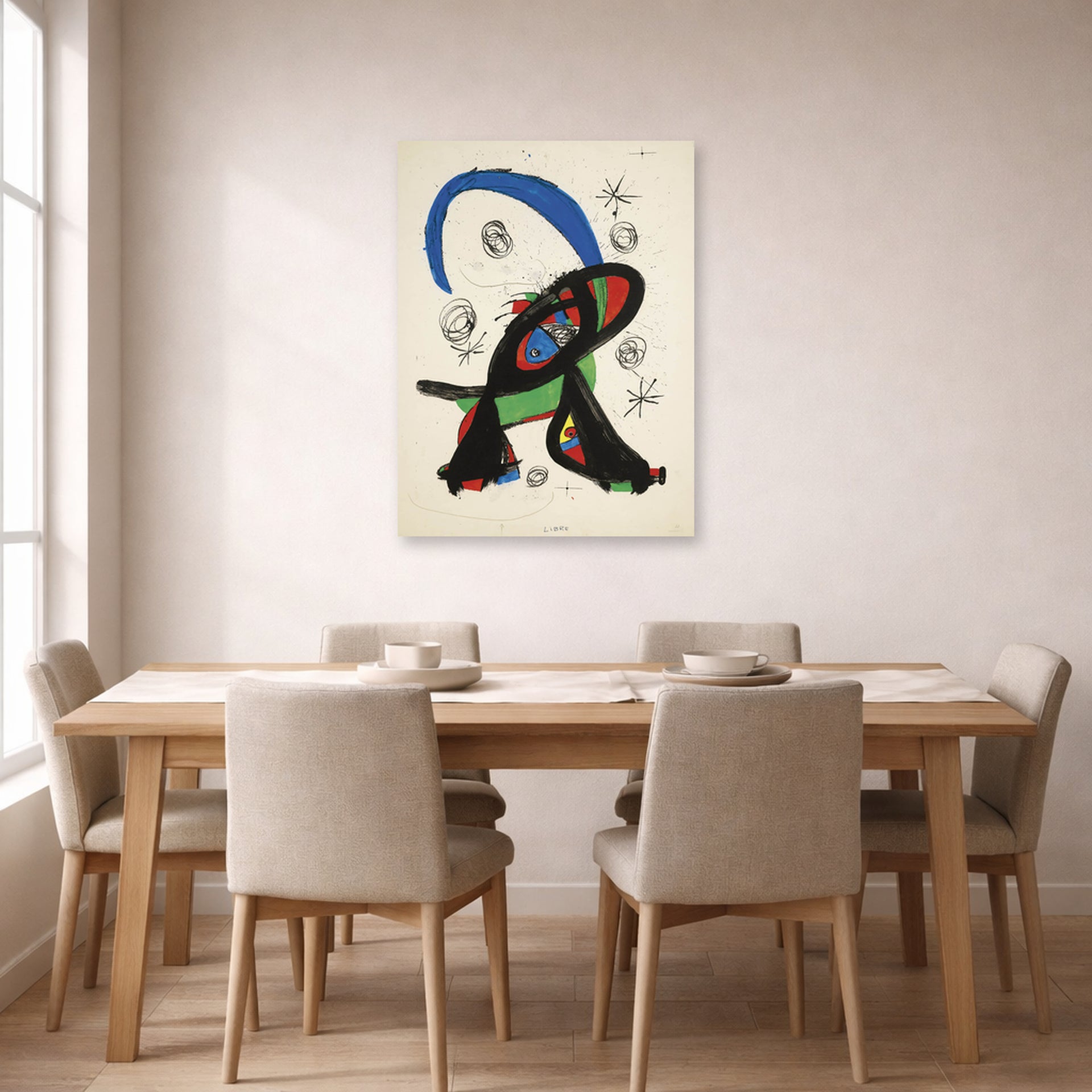 Unframed poster print of Joan Miró's 'Bon Cop De Lluna' displayed on a wall in a dining room