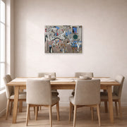 Gallery-wrapped canvas print of Joan Miró's 'Carnival of Harlequin' displayed on a wall in a dining room