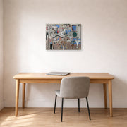 Gallery-wrapped canvas print of Joan Miró's 'Carnival of Harlequin' displayed on a wall in a office