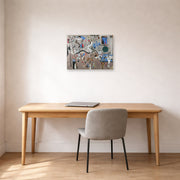 Unframed poster print of Joan Miró's 'Carnival of Harlequin' displayed on a wall in a office