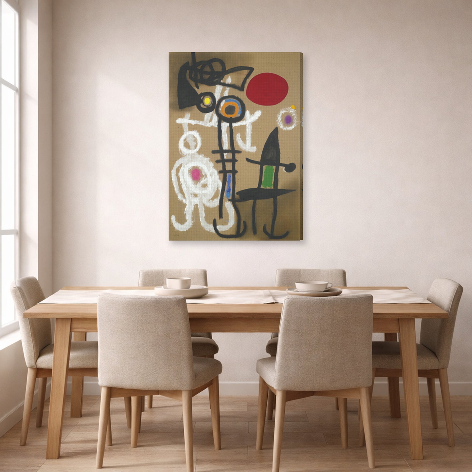 Gallery-wrapped canvas print of Joan Miró's 'Characters and Birds Before the Sun' displayed on a wall in a dining room