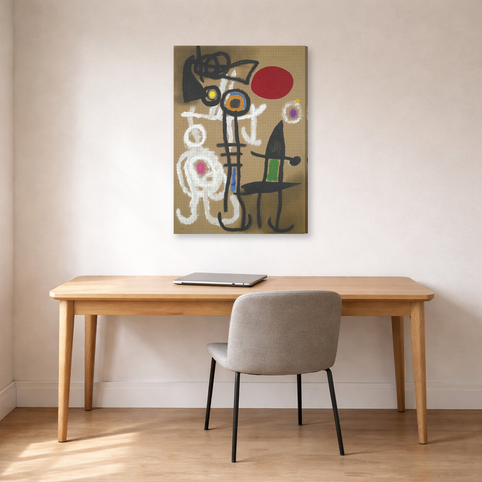 Gallery-wrapped canvas print of Joan Miró's 'Characters and Birds Before the Sun' displayed on a wall in a office