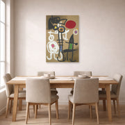 Unframed poster print of Joan Miró's 'Characters and Birds Before the Sun' displayed on a wall in a dining room
