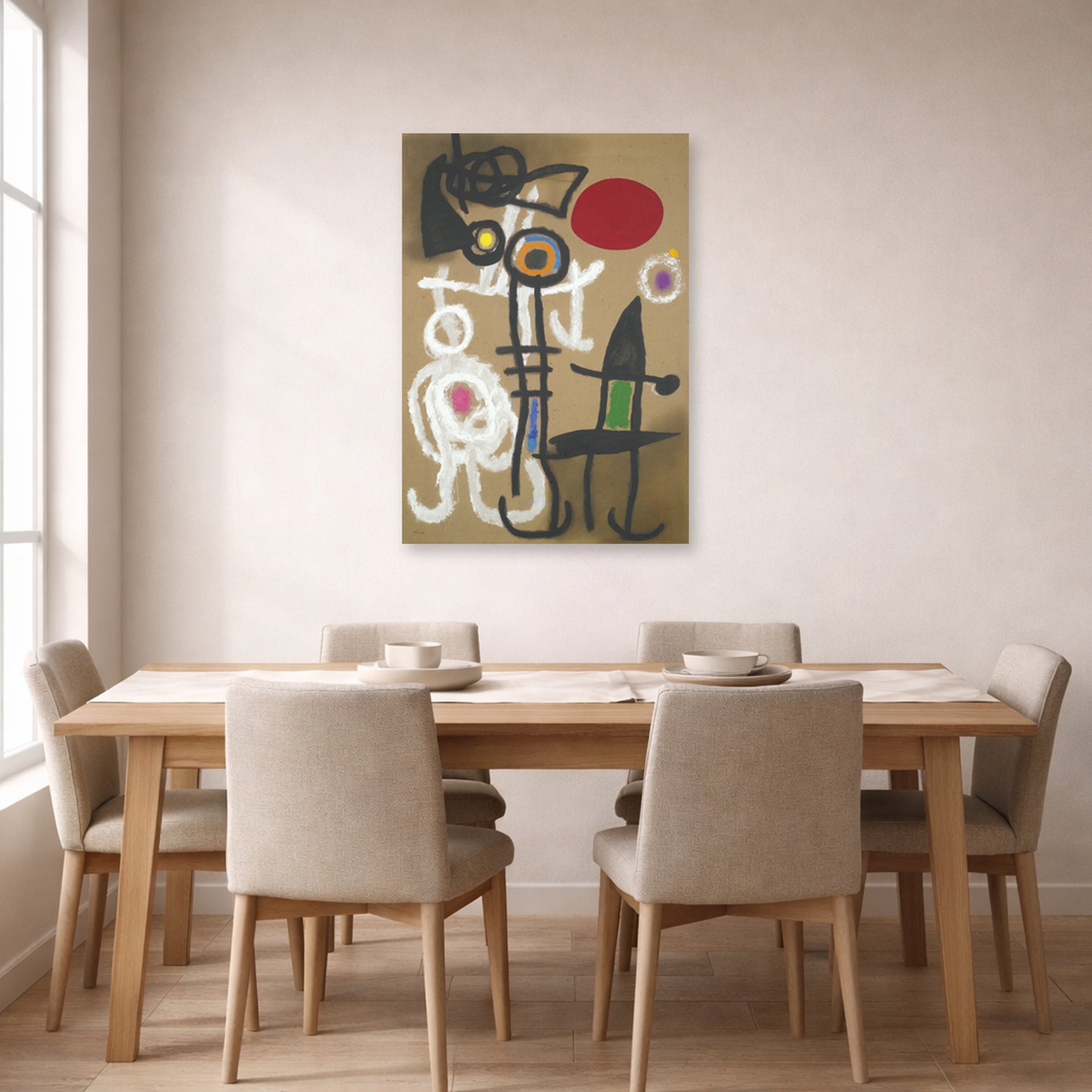 Unframed poster print of Joan Miró's 'Characters and Birds Before the Sun' displayed on a wall in a dining room