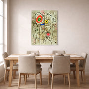 Gallery-wrapped canvas print of Joan Miró's 'Composition Au Visage' displayed on a wall in a dining room