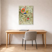 Gallery-wrapped canvas print of Joan Miró's 'Composition Au Visage' displayed on a wall in a office