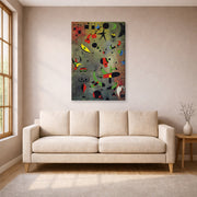 Gallery-wrapped canvas print of Joan Miró's 'Constellation Awakening at Dawn' displayed on a wall in a living room