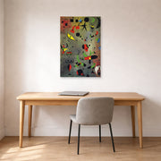 Unframed poster print of Joan Miró's 'Constellation Awakening at Dawn' displayed on a wall in a office