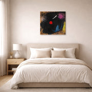 Gallery-wrapped canvas print of Joan Miró's 'Dancer in Front of the Sun' displayed on a wall in a bedroom