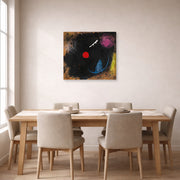 Gallery-wrapped canvas print of Joan Miró's 'Dancer in Front of the Sun' displayed on a wall in a dining room