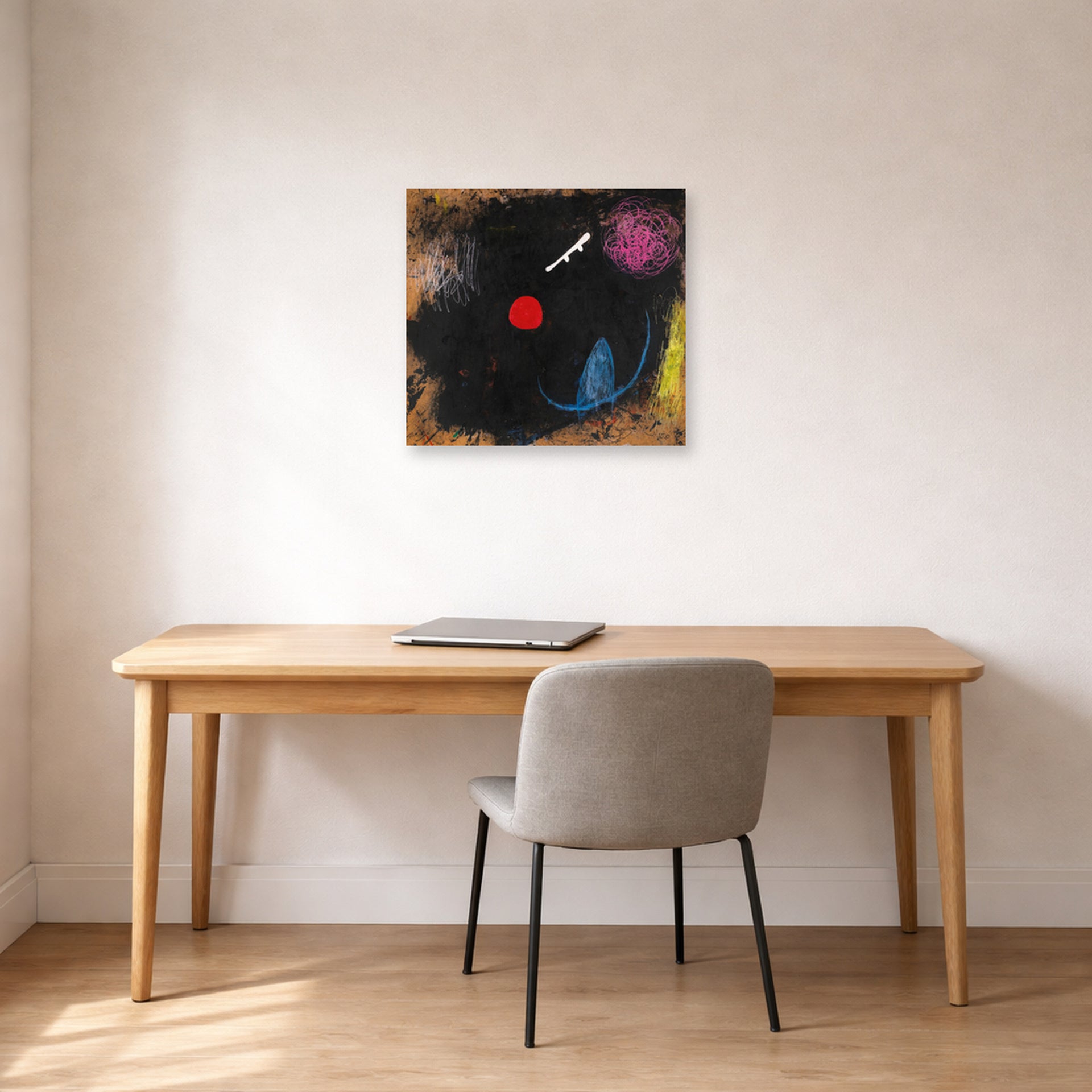 Unframed poster print of Joan Miró's 'Dancer in Front of the Sun' displayed on a wall in a office