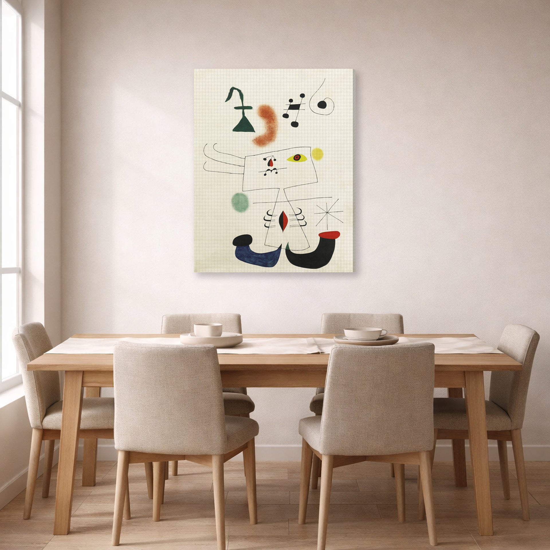 Gallery-wrapped canvas print of Joan Miró's 'Emme Revant De L'evasion' displayed on a wall in a dining room