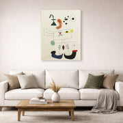 Gallery-wrapped canvas print of Joan Miró's 'Emme Revant De L'evasion' displayed on a wall in a living room